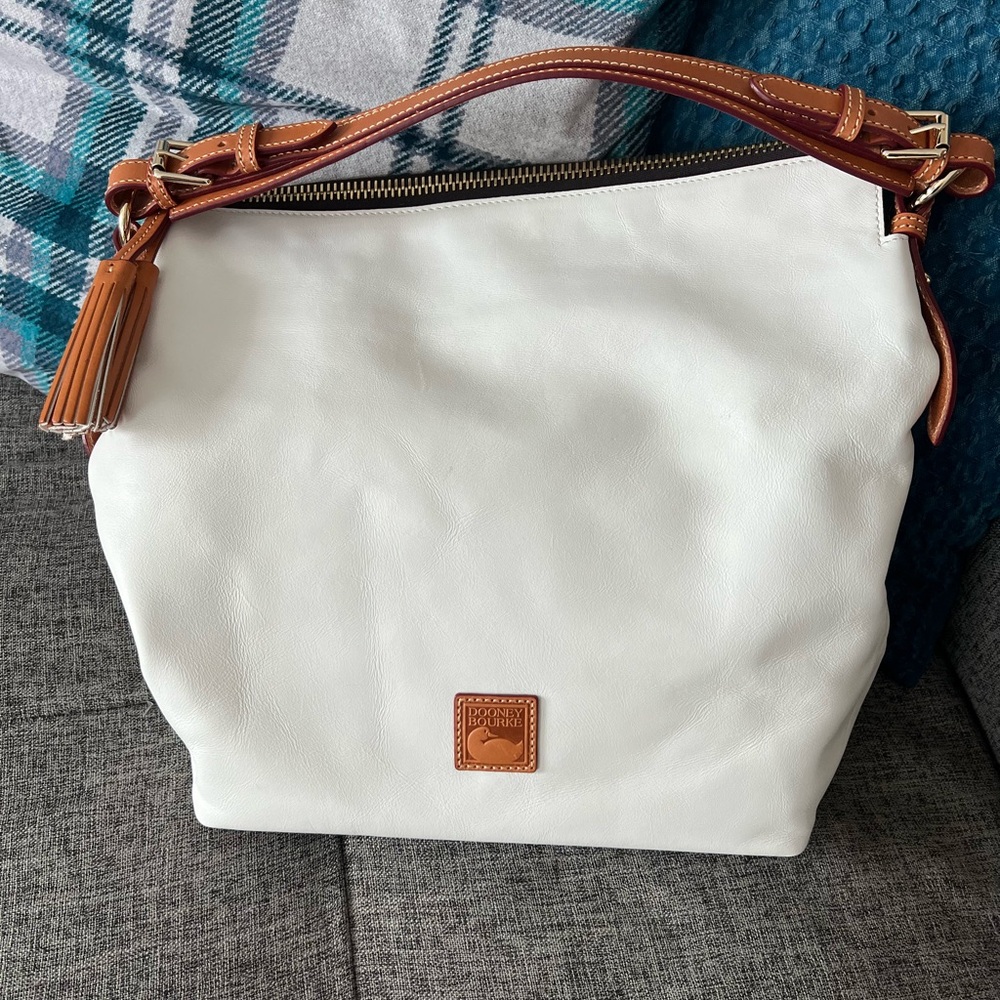 Dooney and Bourke McKenzie hobo in white Florentine leather.